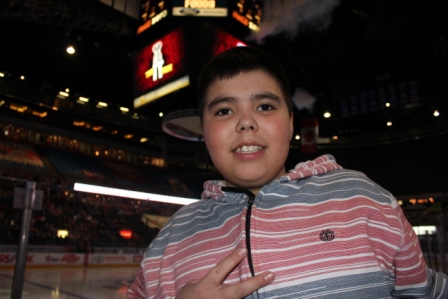 Mason Larocque, a grade 6 student from Elizabeth School in Cold Lake Alberta and his classmates won tickets to an Edmonton Oil Kings game through the "Reading, give it a shot" literacy program.