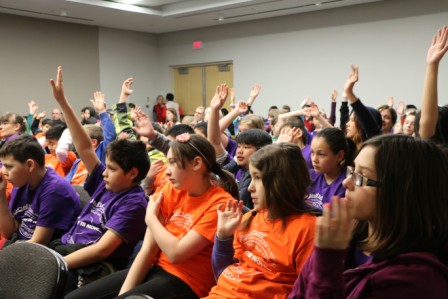 Children listen attentively to an address by Commissioner Wilton Littlechild on Education Day at the TRC event in Edmonton. Story by Brandi Morin; Photos by Terry Lusty