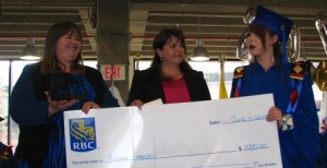 Breanna Makokis receives a $1,000 award from RBC representatives Leslie Natyshen and Angela Ferguson