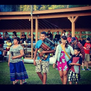 Wab Kinew was honoured in his home community this summer by Chief Kathy Kishiqueb at Onigaming Powwow