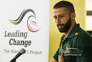 Edmonton Eskimos quarterback Mike Reilly speaks to Edmonton Huskies players  about the power of peers to prevent gender-based violence.     Photo by Codie McLachlan/Edmonton Sun/QMI Agency