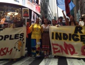 indigenous activist Casey Camp-Horinek  with Melina Laboucan-Mossimo and Crystal Lameman near Times Square in New York City at the climate march in New York City last month.     Photos supplied;  Article by Brandi Morin 