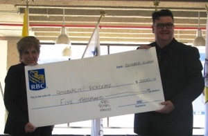 RBC Northgate Manager Leslie Natychin donates $5,000 to Amickwaciy students lunch program 