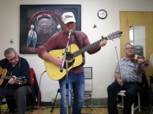 Lead singer Gareth Haugen is accompanied by Wesley Cardinal (l) and Leonard Venne (r)