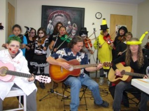 The Prince Charles School Fiddlers: seated in front (l-r) Ethan McNeil, Garry Lee, Judy Gatto standing (l-r) Rickal Lafontaine, Xiadani Ramirez, T’Keyah Desjarlais, Kaylee Baxter, Demaris Badger, Pierce Cardinal, Sarah Dornbusch, Chante Okemow, Ben Nicholas