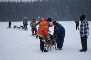 Colin Mackay, Little Buffalo School Teacher (left) and Kevin Lewis (right), making everything is ready to go for dog sledding around Marten Lakes.