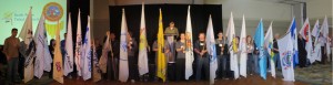 Treaty 8 First Nation Banners line the front of the main stage.