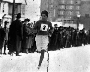 Alex Decoteau nearing a finish line at a Christmas Day race in Edmonton, 1915.