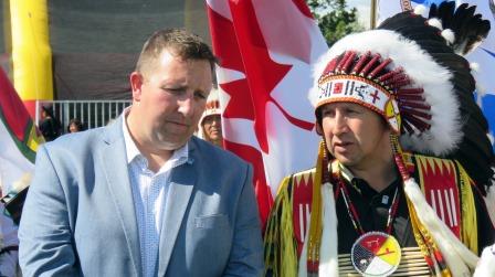 Northlands President and CEO Tim Reid and ANSN Chief Tony Alexis share a moment during the first-ever ten-day powwow ever held during the annual K-days celebration. Photos by John Copley