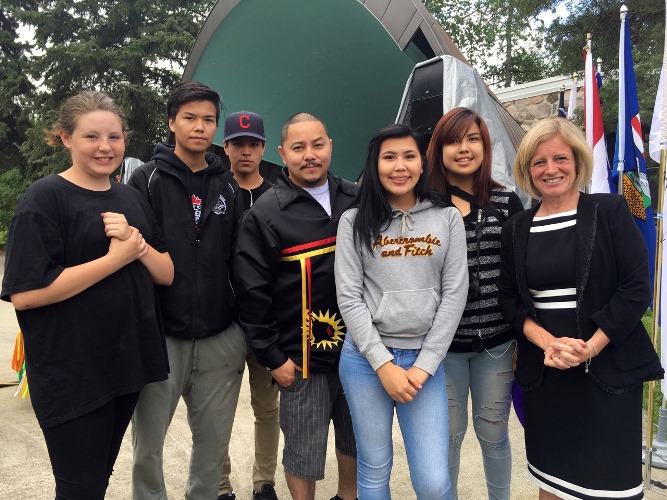 (l-r) Teresa Beauvais, Kimiwan Johnson, Blaye Chickosis, Terris Mah, Kira Currie, Tamara Whitehead & Premier Rachel Notley.