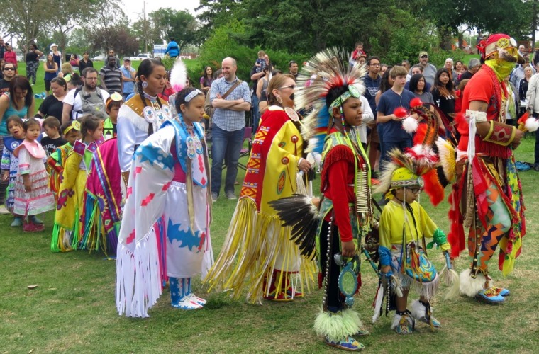 Grand Entry line gets ready to begin the procession during National Aboriginal Day celebrations in Edmonton at Borden Park on June 21, 2016.