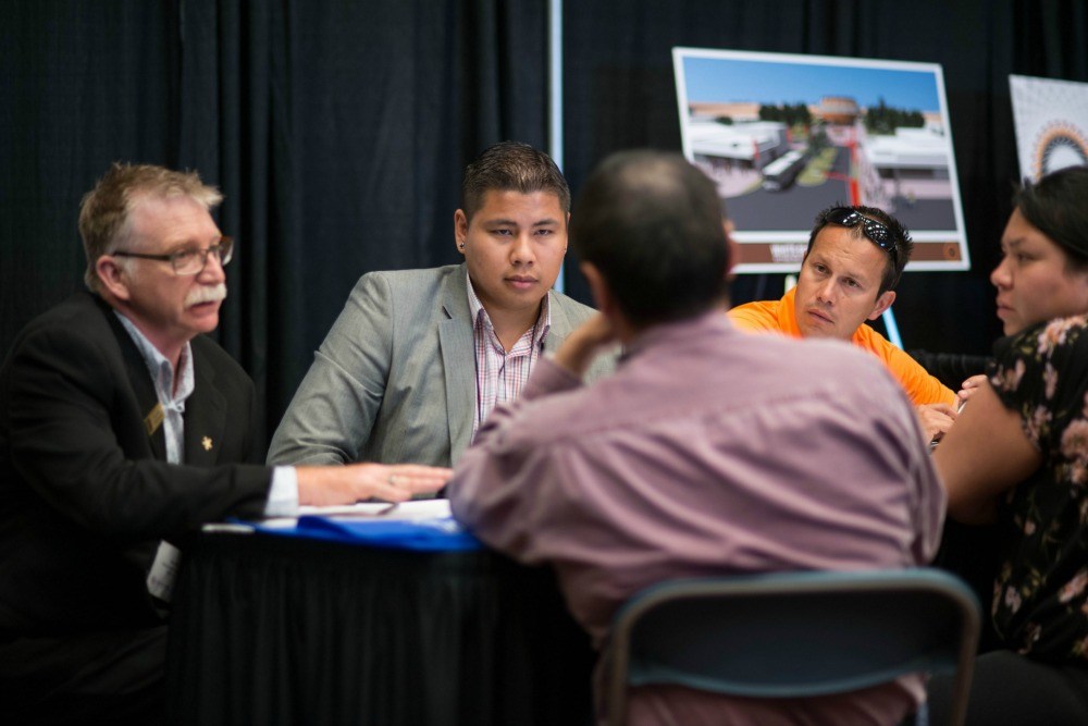 Aboriginal Business Match (ABM) delegates discuss business opportunities on the tradeshow floor. ABM provides a supportive and confidential setting for pre-selected appointments like these to take place all across Canada. (CNW Group/Raven Events)