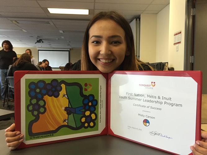 Misty Carson, 16, of the Paul First Nation, smiles proudly with her completion certificate from August's First Nations, Métis & Inuit Summer Youth Leadership Program at NorQuest.