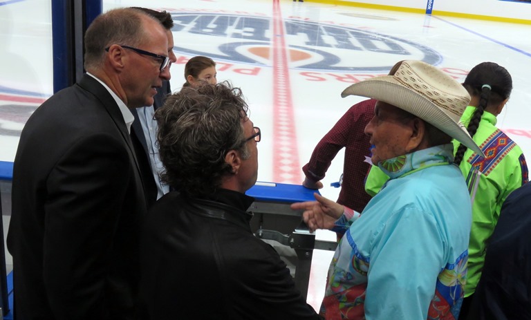 Alex Janvier with Edmonton Oilers owner Darryl Katz and Vice Chair Kevin Lowe. Photo by John Copley 