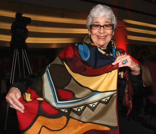 Daphne Odjig spreading joy in 2011 with one of her own creations. Photo by Lisa Siegel