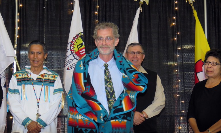 Amiskwaciy Academy Elders Francis Whiskeyjack, Don Langford and Jeanette Lean with Honour Blanket recipient MacEwan University Professor Robert Wizmura.