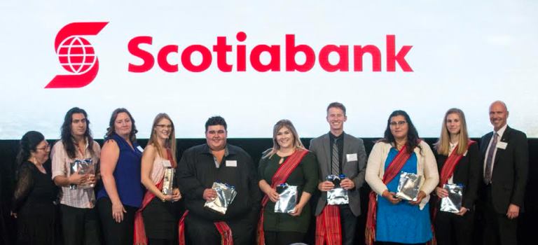 Representatives from ScotiaBank with the iPad Draw winners. 