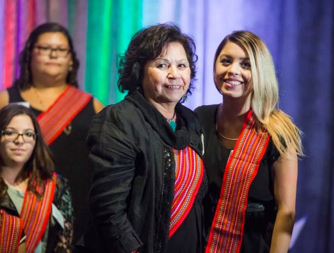 Elder Betty Letendre with an award recipient. 