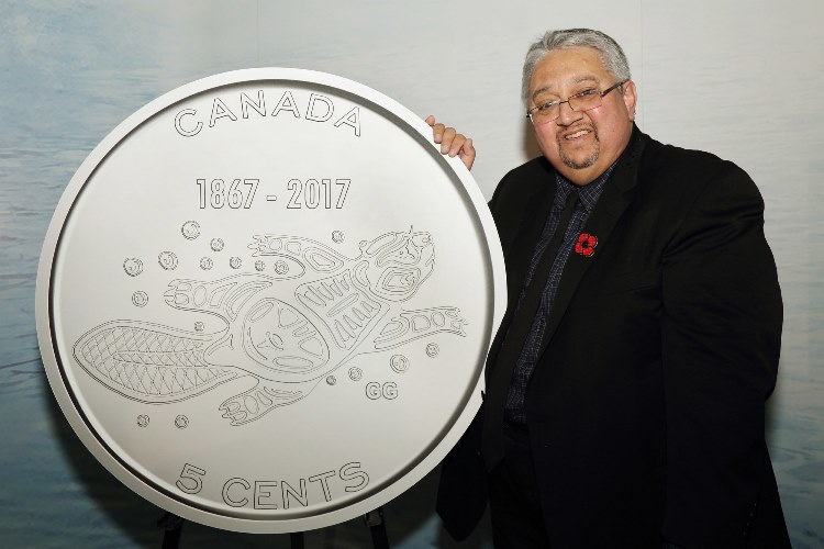 The Royal Canadian Mint revealed the winning designs for the Canada 150 circulation coins on November 2, 2016. Gerald Gloade of Millbrook First Nation, Nova Scotia designed the 5-cent coin called Living Traditions. All five Canada 150 coin denominations will enter circulation in the spring of 2017.‎ (CNW Group/Royal Canadian Mint)". 