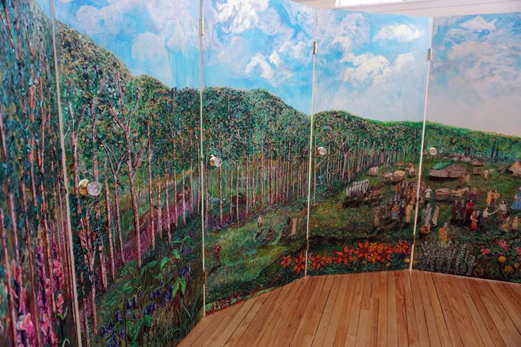 "Buffalo Corral" by Heather Shillinglaw consists of a panorama made of paneled doors to depict Metis History. 