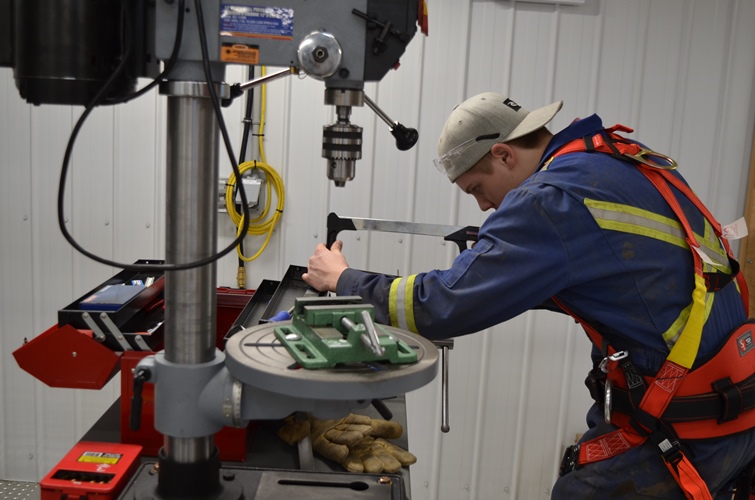 A student demonstrates skills during an Open House at Northern Lakes College.